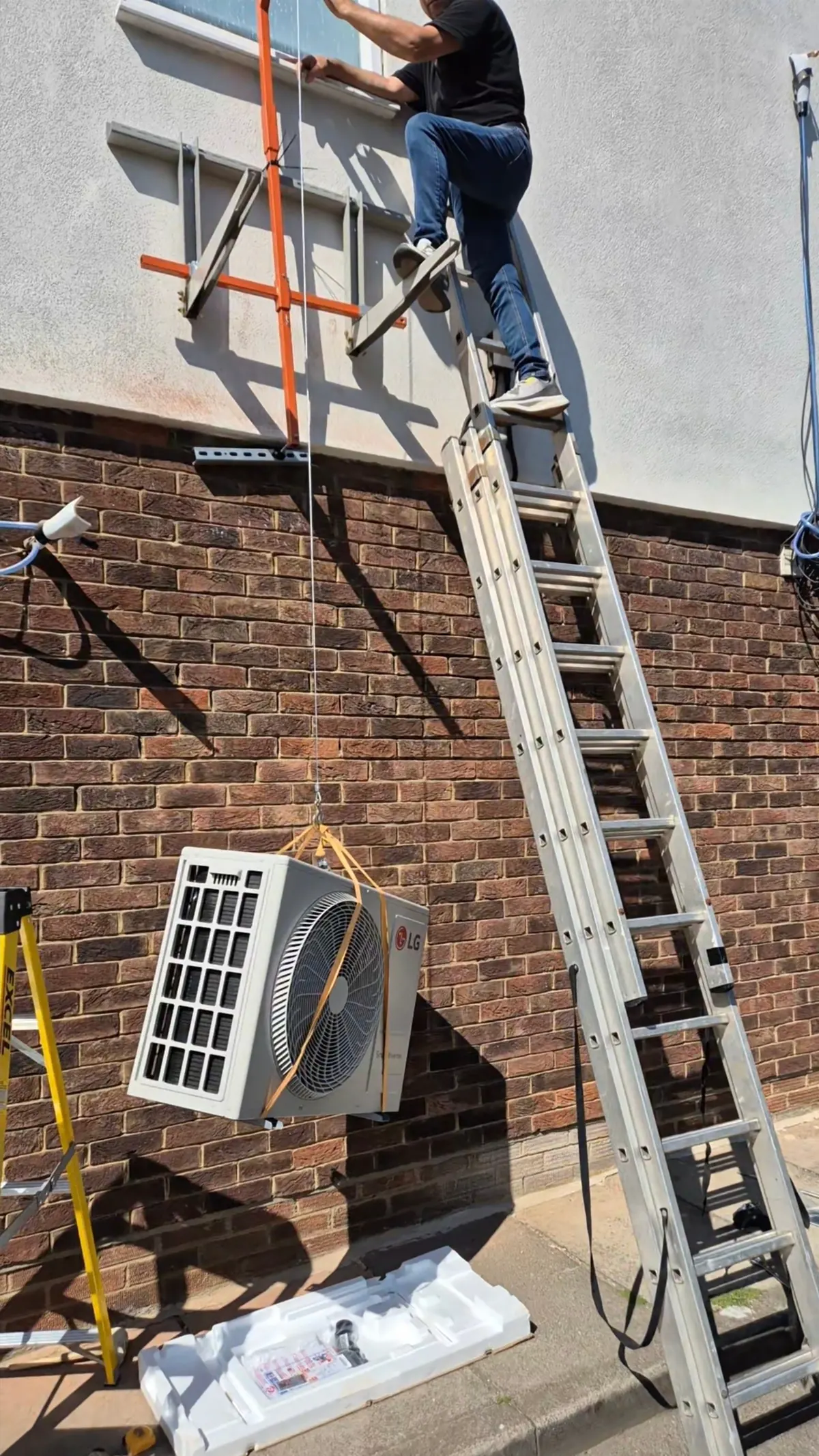 Air source heat pump outdoor unit installed beside a London house