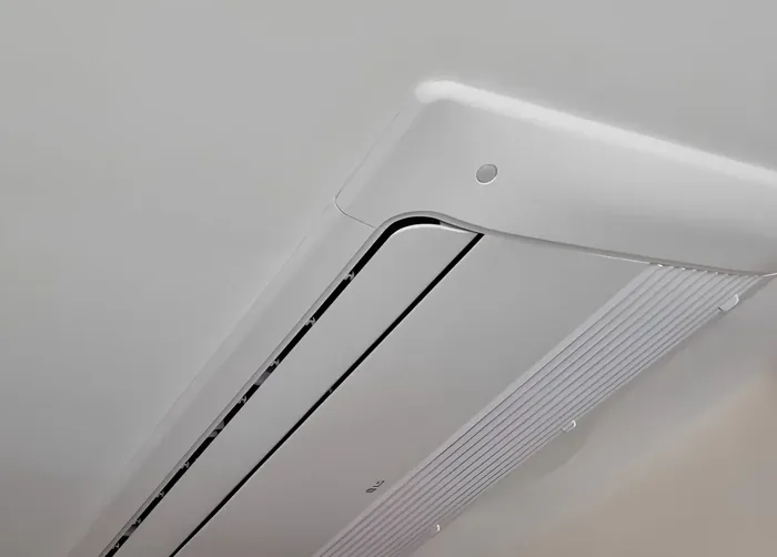 A ceiling cassette air conditioning unit fitted in a commercial space